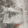 --Frammento con epigrafe di epoca traianea inglobata nella muratura